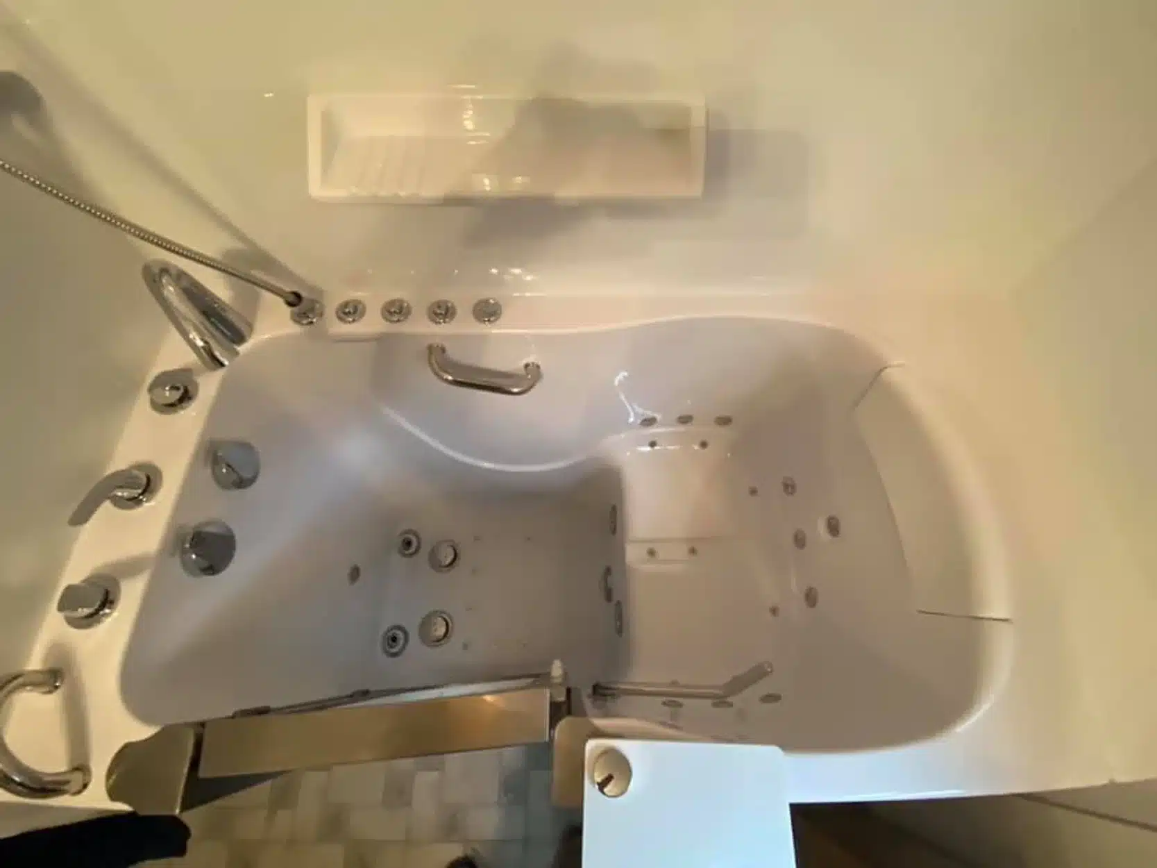 Walk in tub in residential bathroom in Dayton, OH.