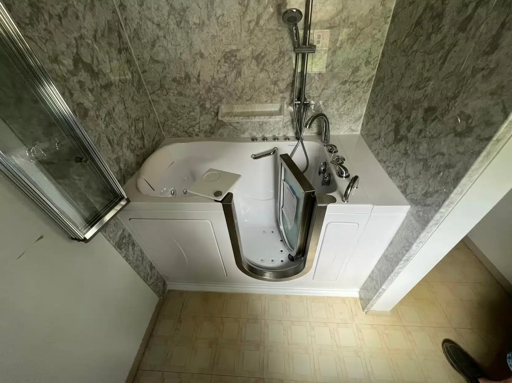 Walk in tub in residential bathroom in Dayton, OH.